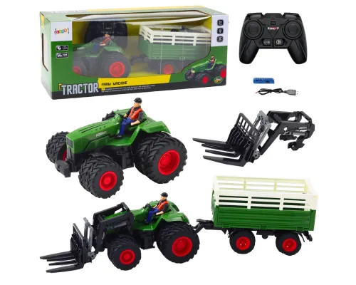 Daljinsko voden RC traktor s prikolico vilicami dvojnimi kolesi 21207